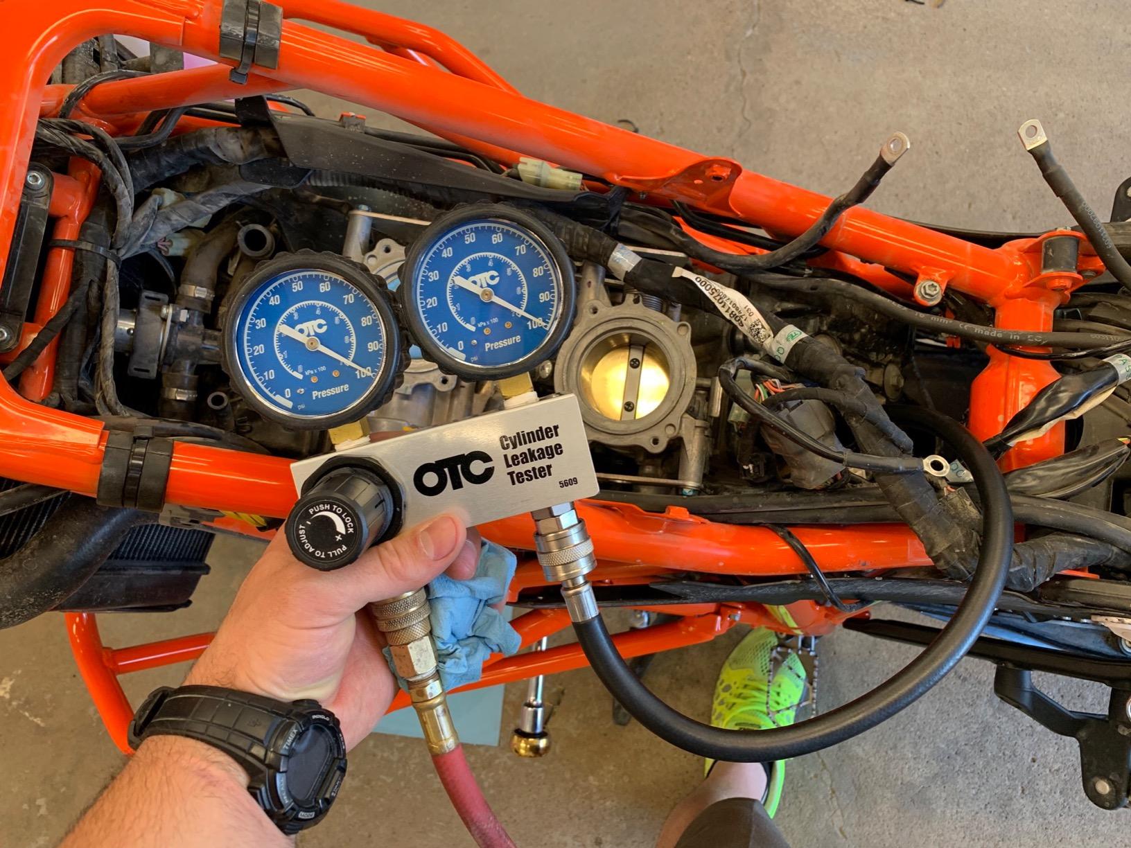 OTC 5609 Cylinder Leakage Tester Kit - Quickly Diagnose Internal Engine Problems like Bad Rings, Valves, and Leaking Head Gaskets | Dual 2-1/2 Gauges, Pressure-Regulated Manifold, 24 Hose, 10/12/18 Mm Adapters, Hard Case customer photo 2